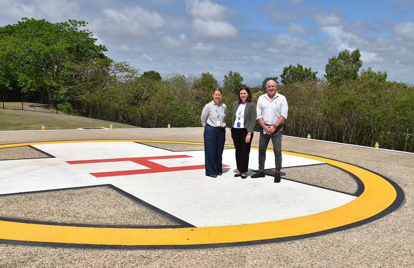 Photo of people on the newly refurbished Mackay Base Hospital helipad