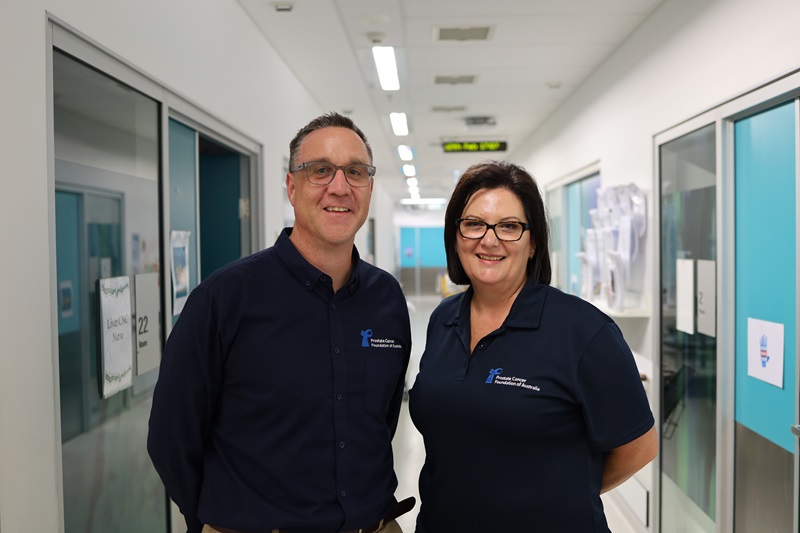 A prostate nurse stands with a man from the Prostate Cancer Foundation
