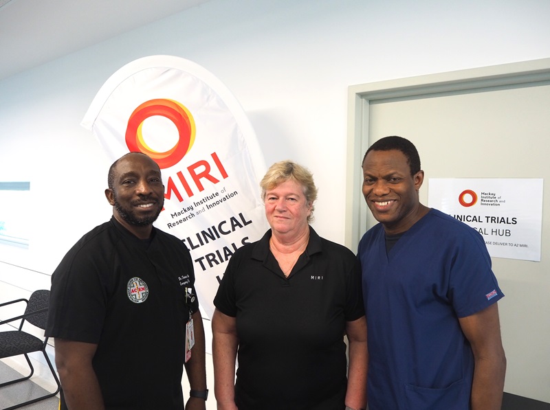 Two ED doctors and a clinical trial nurse pose for a photo