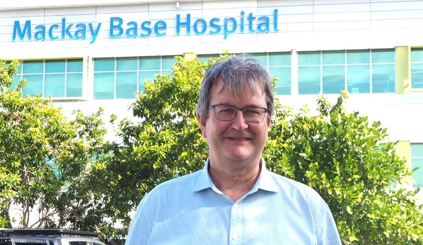 Gastroenterologist stands in front of Mackay Base Hospital building