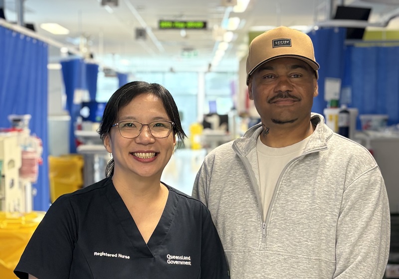 An organ donation patient stands with the organ donation nurse in the renal unit